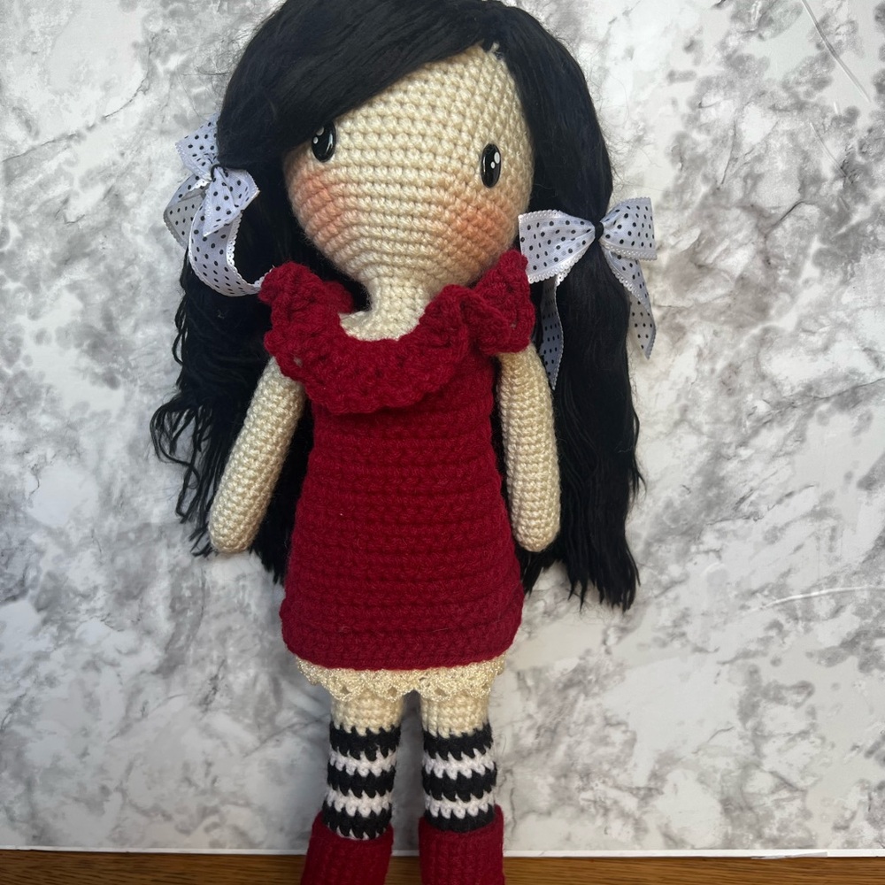 Adorable Crochet Doll with Red Dress and Black Hair